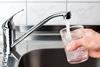 A glass of water poured from a kitchen tap   Copy