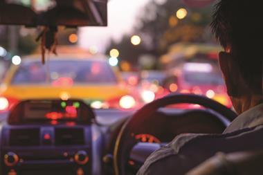 Busy traffic intersection and air pollution