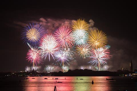 A photograph of a fireworks display over Venice